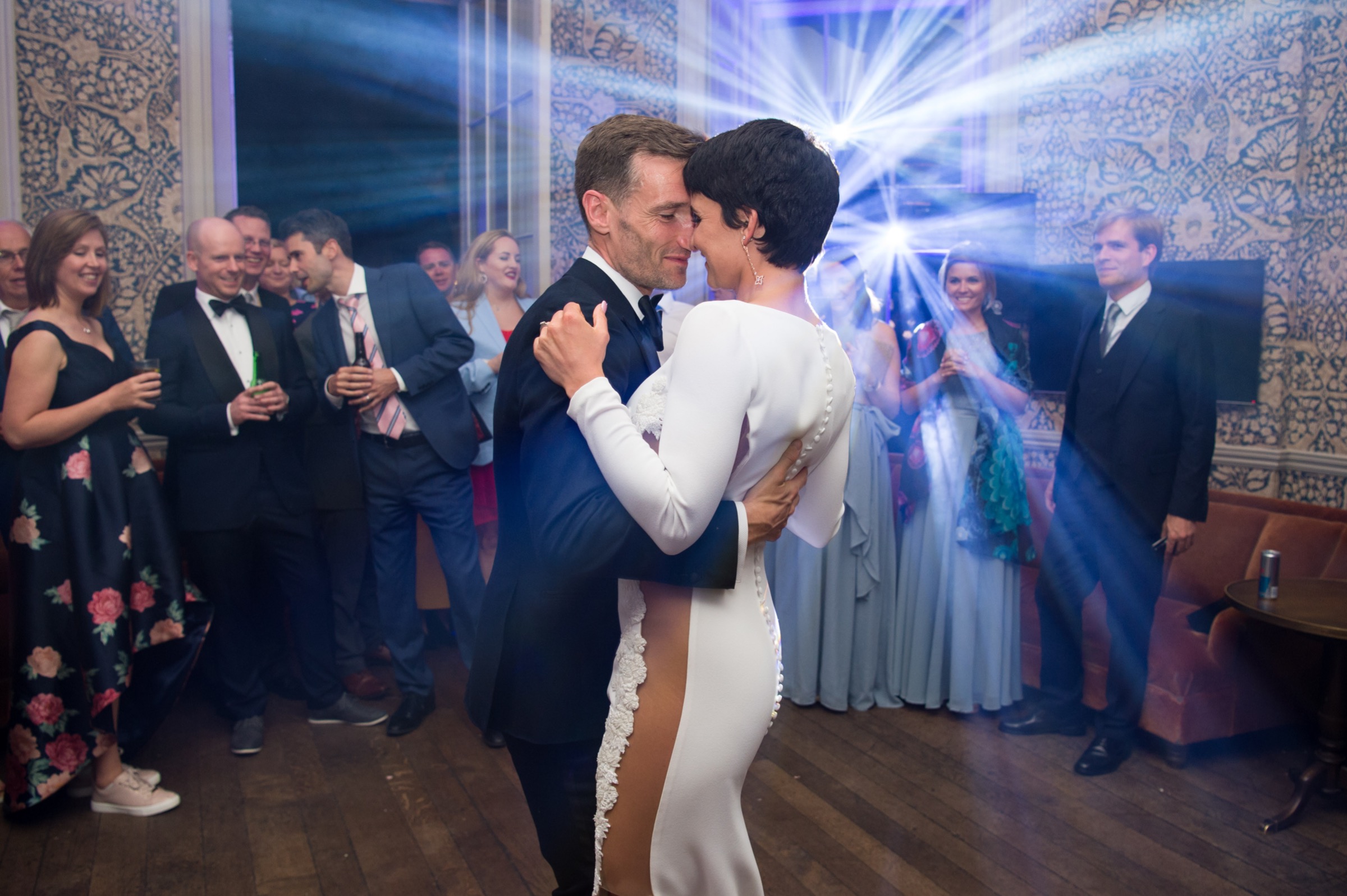 a bride and groom dancing at babington house